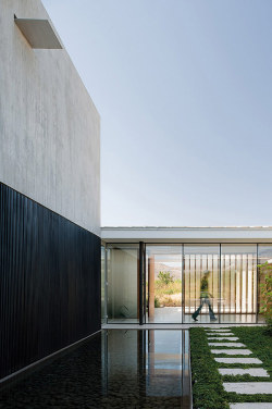 throughjo:  black and concrete…  a modern house in chili by 57STUDIO