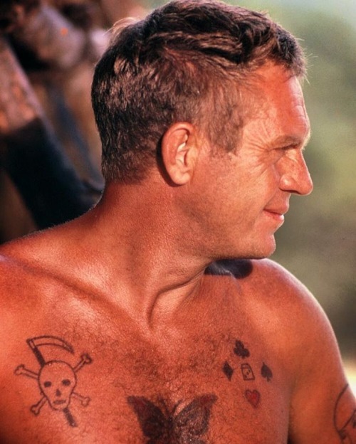 12 Baddestass tattoos in movies from George Clooneys neck to Tom Hardys  everything