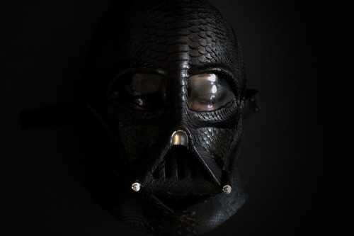 One-of-kind Darth Vader helmet made from black Python and 24k gold.