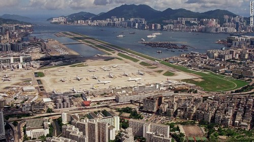 brittq:  Pictures of the former Kai Tak International Airport in Hong Kong (closed since 1998), taken by aviation photographer Daryl Chapman. The airport was located within the city, producing what has to be the most thrilling plane landing and viewing