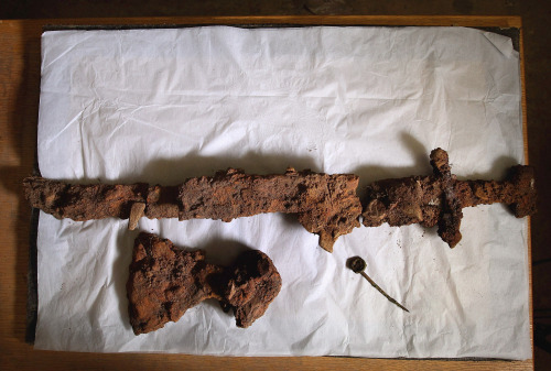 coolartefact:  Bronze sword, axe and pin found in Viking’s boat burial. Ardnamurchan, Scotland, 10th century BC Source: https://imgur.com/B5mzYGm