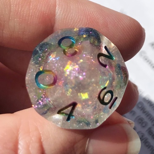 battlecrazed-axe-mage: Surpriiiiiise–I made ‘em rainbow!  These are Cozy Gamer’s Celestial dice with