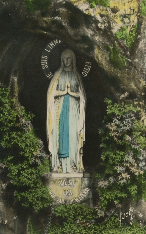 allaboutmary:A vintage postcard of the statue of Mary in the grotto of Lourdes.