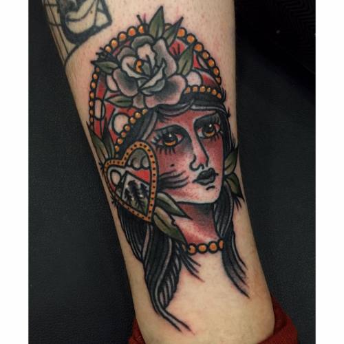 Traditional lady head tattoo, done by Nicholas G