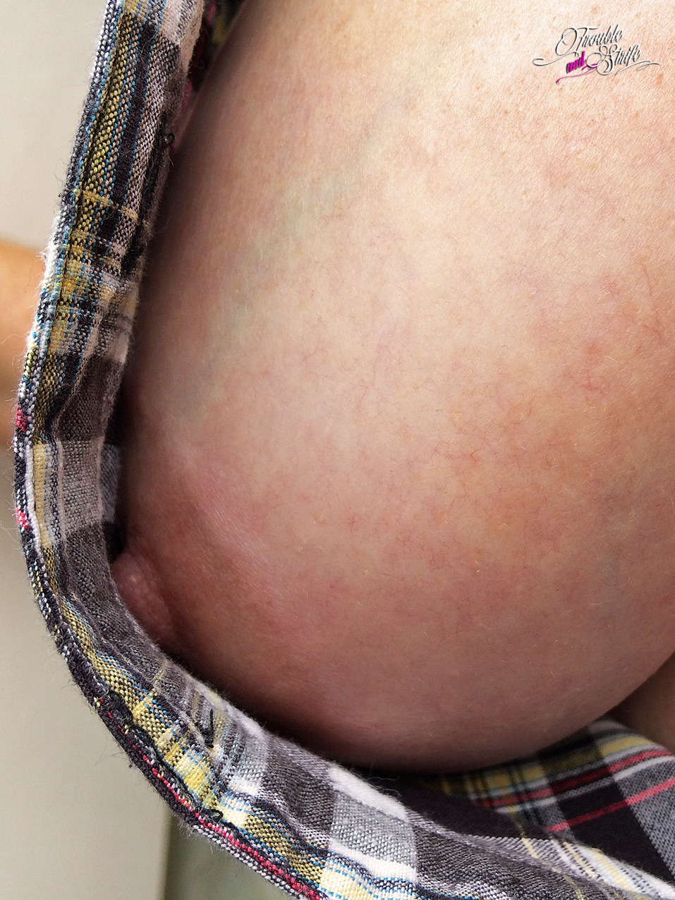 Fit to burst - part 2Mrs Splani undoing more buttons, releasing the pressure! At