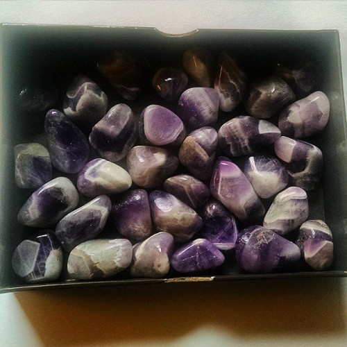 Soon to be in my shop- tumbled chevron amethyst pieces along with malachite, tigers eye, rose quartz