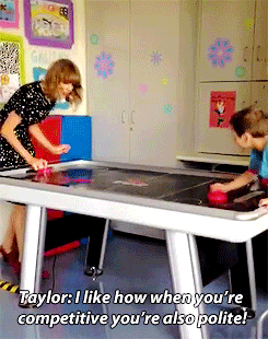 outofthewoods: Taylor plays air hockey with Jordan in the Boston Children’s Hospital