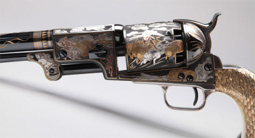 Gold and silver Colt Third Model Dragoon Revolver owned by western singer/actor Gene Autry.Decoratin