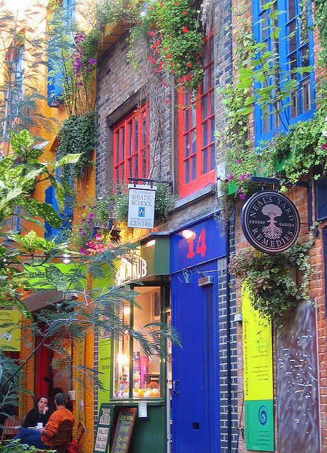 magicalhomesandstuff: The colorful little alley of Neal’s Yard, in London.  Neal’s Yard: Covent Gard