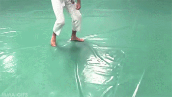 mma-gifs:  Gracie Challenge #3: 4 Quarter Challenge! Place four quarters on your