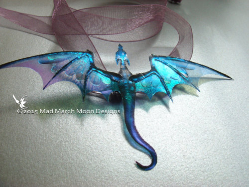 sosuperawesome:Iridescent dragon earrings, ear cuffs, hair clips, hair sticks and necklaces by MadMa