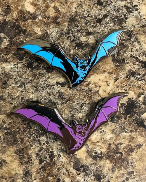 I finally made enamel Bat pins! They come in teal or purple on shiny silver metal. They have two pin