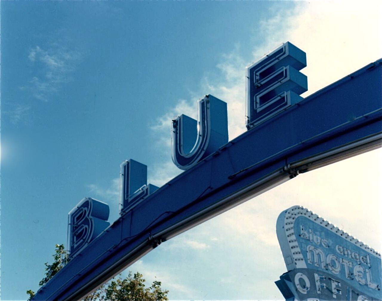 Signs at Blue Angel Motel, 1990. After the demolition of the Blue Angel Motel in 2015, this sign remained, and “Blue” was changed into “Night” for Club 2100. It too was removed in 2018. Photo by William Greiner.