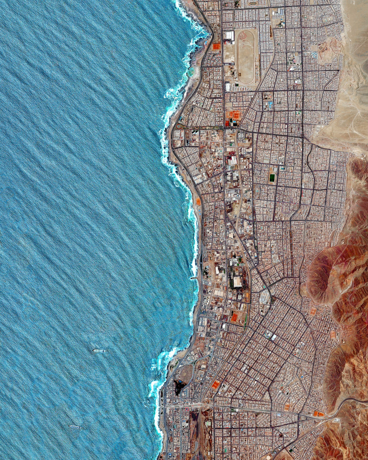 Waves of the Pacific Ocean roll into the city of Antofagasta, situated on the coast of Chile. Because this area is situated in the Atacama Desert - the driest region in the world - it has incredibly sparse vegetation. In total, Antofagasta is home to...