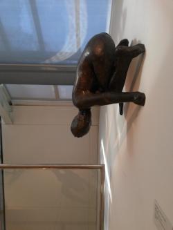 sixpenceee:  This creepy stairwell statue was located at the Metropolitan Museum of Art in NYC. It’s called Lilith, and was made by Kiki Smith. Smith does very surreal and unnerving art. 