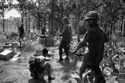 vietnamwarera - “American soldiers guarding North Vietnamese...