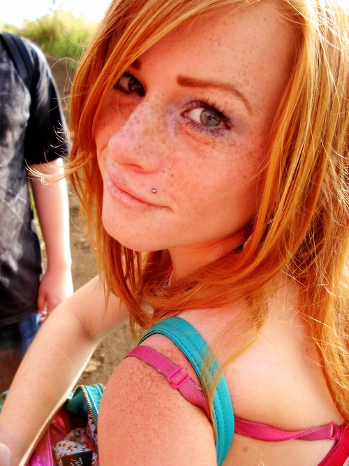 Young teen redhead with freckles