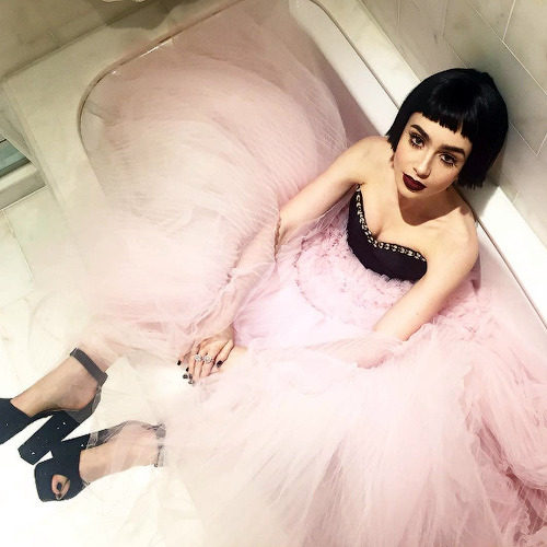Lily Collins Source