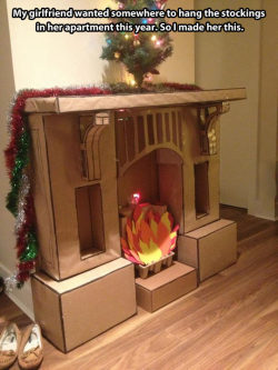 lulz-time:   kiragustafson:   Cardboard fireplace  They’re a keeper.   This post has been featured on a 1000Notes.com blog! 