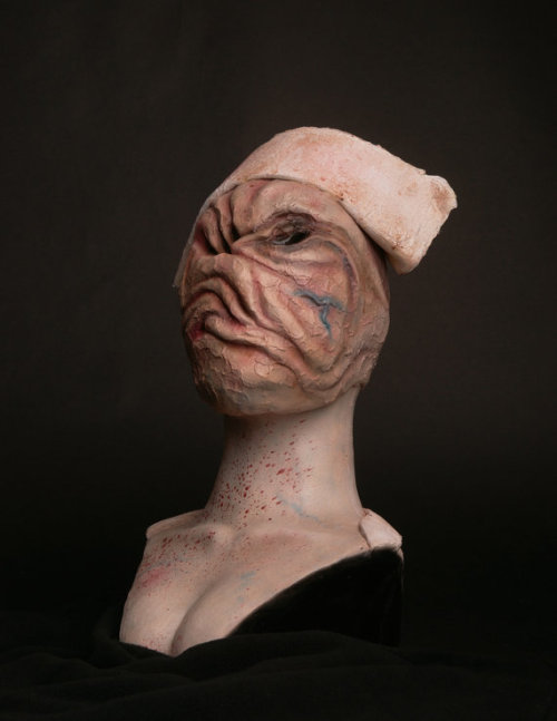 You are looking at a life size Silent Hill Nurse Bust sculpted and finished by the very talented artist Justin Shifflett. The Bust was sculpted with Chevant clay then molded and cast in latex with a polyfoam core. The bust was then finished with a super