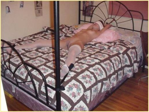 Bed tied spread eagle