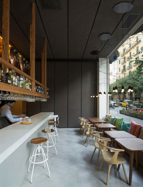 {Love the materiality here, as well as those large, spindly pendants!}Barton is a restaurant, tapas 
