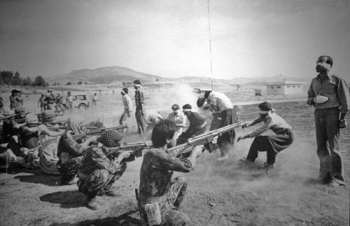chasing-rose:  The Pulitzer Prize winner photographs, Iranian revolutionary guards executing Kurds. The 11 men were executed on august 27, 1979 at the Sanadaj Airport. (Last Photograph) Among the 11 people executed at Sanandaj Airport was this injured