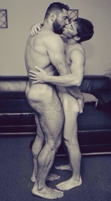 sexwithdad:  Dad holds me in his strong arms, kissing me deeply.