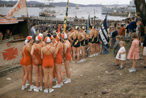 Swimming teams huddle onshore at the annual Royal Hobart Regatta in Tasmania, Australia, December 19