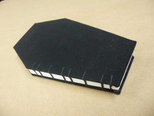 dviantdzyn:vinceaddams:I’m a little behind on bookbinding homework, but I finally got this one finis