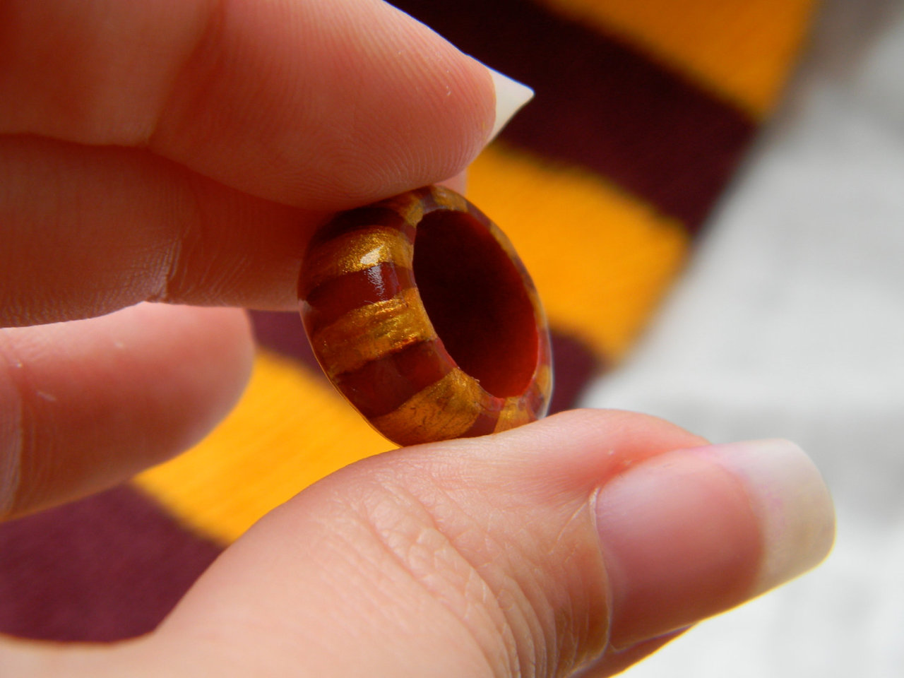 I have an Etsy shop! I make dreadlock beads and stuff, like this super cool Gryffindor