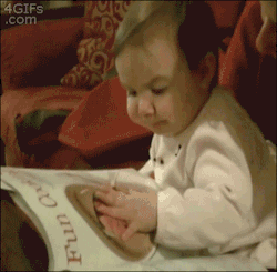 sickweave:  lolzpicx:  Baby tries to eat cookies from a magazine  idiot