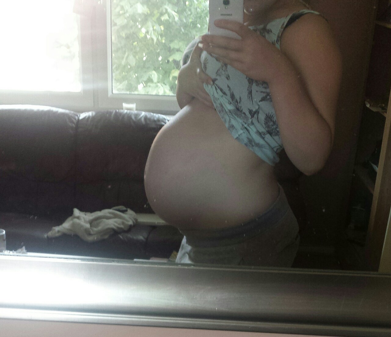 vickyandchick:  Side and front belly shots from 33 weeks. I swear he’s dropped