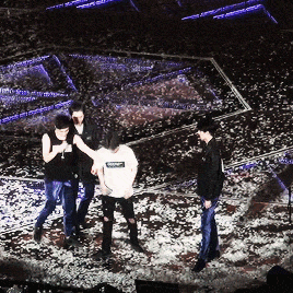 wooyoung: members attacking baekhyun with confetti