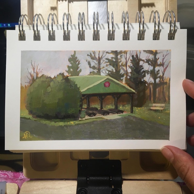 a painting of a pavillion in a park, surrounded by trees and a gravel road in the foreground.