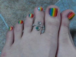 themissarcana:  Gifted toe ring! Just a couple quick pictures before I take off the rainbow polish. I like to change the polish color like every day or every other, but when I do rainbow I leave it on for a while cause it takes so long to do.