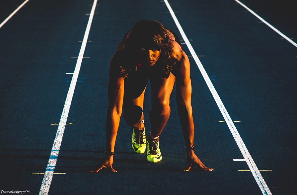 florez:  A color photo of Olympic heptathlete Chantae Mcmillan, inspired by a black