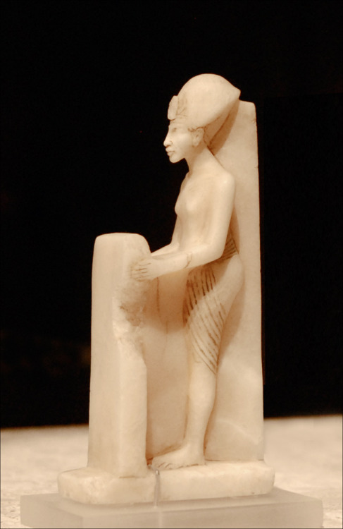 Statuette of the 18th Dynasty pharaoh Akhenaten (r. ca. 1353-1336 BCE) holding a stele.  Now in the 