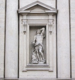 fuckyeahstsebastian:  Roma, Sant'Andrea della Valle. San Sebastiano, created by Domenico Guidi (1625 – 1701), stands in a niche of the façade overlooking the Corso Vittorio Emanuele II.
