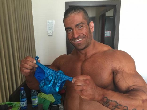 freakmuscle: Bodybuilder is happy about his new posing trunk. Hot guy. And hot speedo.