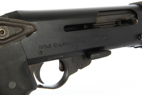 gunrunnerhell:SPAS-12One of the most distinct features of this Italian shotgun is the top-folding me