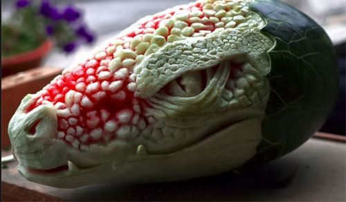 sixpenceee:  This is a carved water melon. 