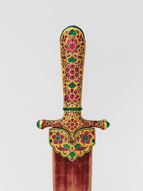 Dagger and SheathDate: ca. 1605–1627Culture: Indian, MughalMedium: Steel, gold, ruby, emerald, wood,