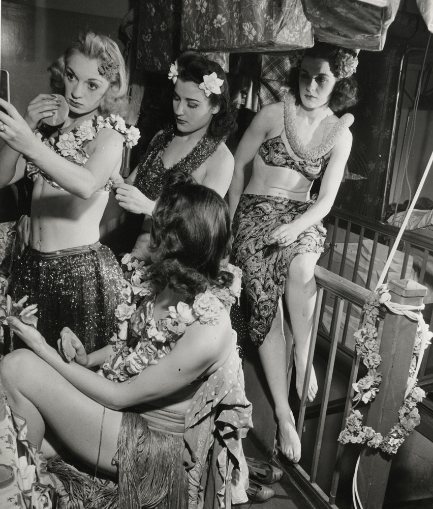 maudelynn:  Burlesque Dancers backstage, preparing for a Hula number c.1941  via