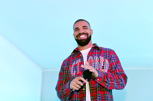 celebritiesofcolor:   Drake performs before the game between the Toronto Raptors and the Cleveland Cavaliers on November 25, 2015 at the Air Canada Centre in Toronto, Ontario, Canada. 