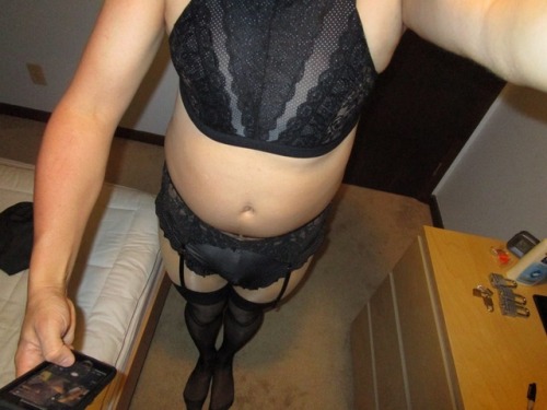 chastity-sissy-megan: I am in my thong and seem stockings today. Hope you all like my pics. Putting 