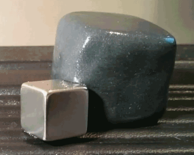 littlebunnysunshine:Magnetic putty engulfs piece of metal