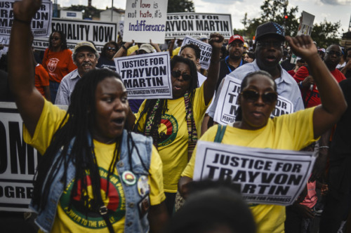 fuckyeahmarxismleninism:Seeing ‘New Jim Crow’ Placards Seized by Police & More From the March on