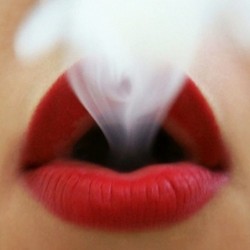 thestylesfashion:  #lip #red #kiss #smoke 