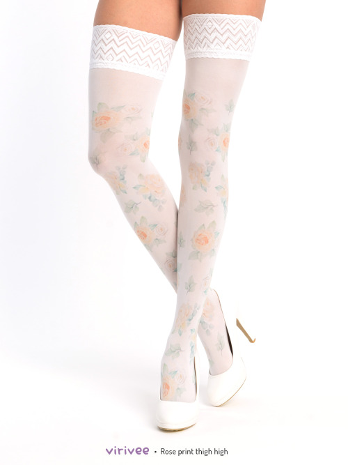Yellow rose print thigh high stay-up  Printed yellow rose pattern on white semi-opaque hold-up. The 
